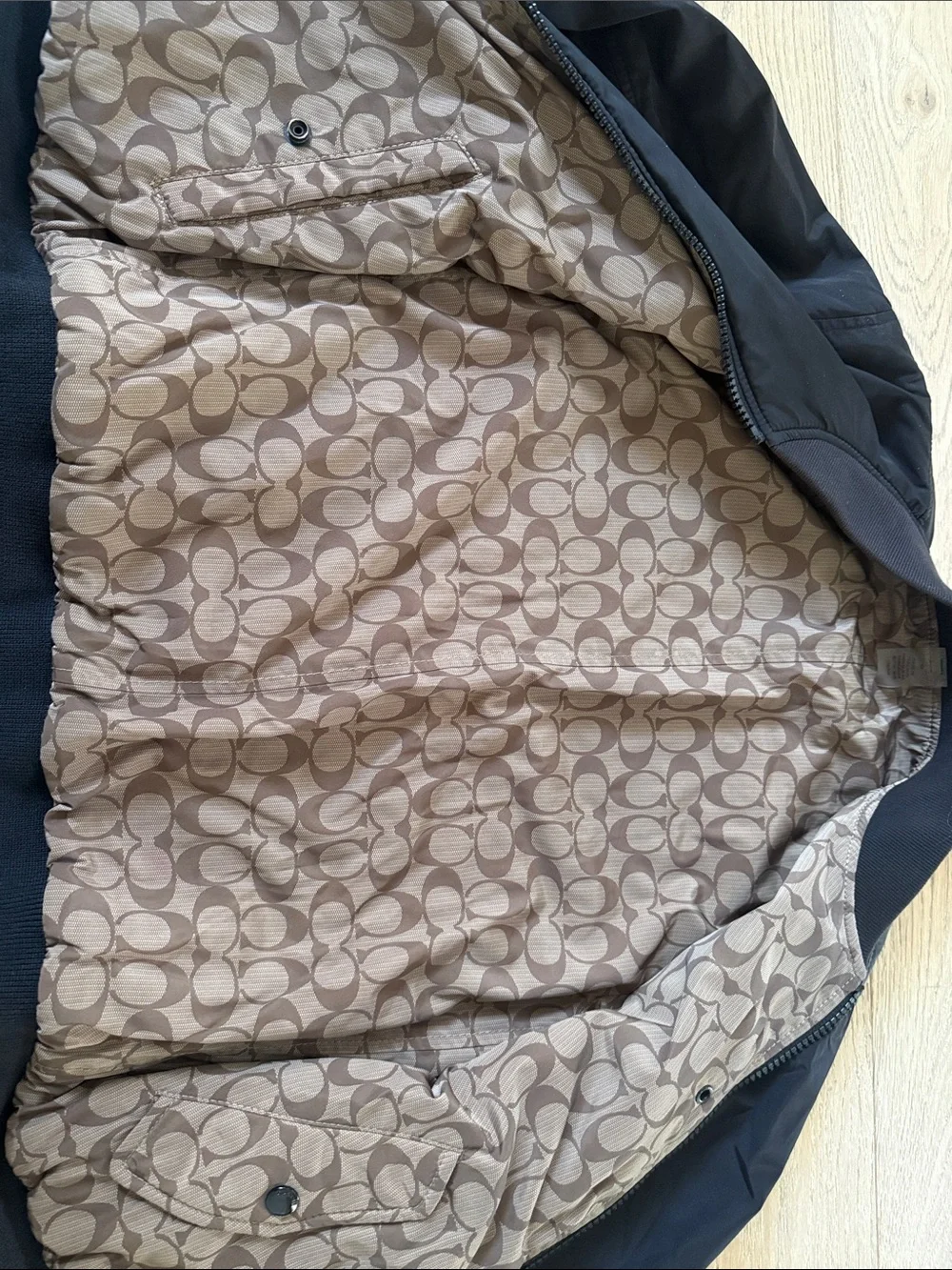 Coach Black Bomber Jacket with Signature Tan Lining